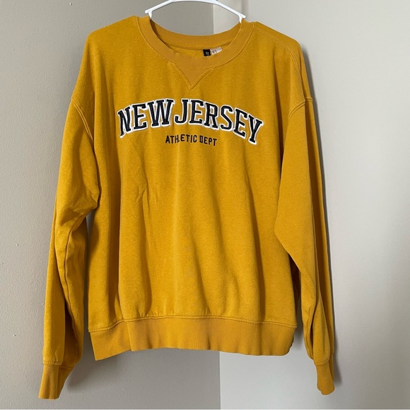 Divided Tops - New Jersey Athletic Dept Women’s Yellow Crew Neck DIVIDED H&M Size Medium